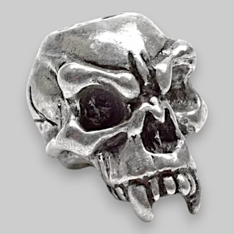 fang-skull-glaenzend.webp